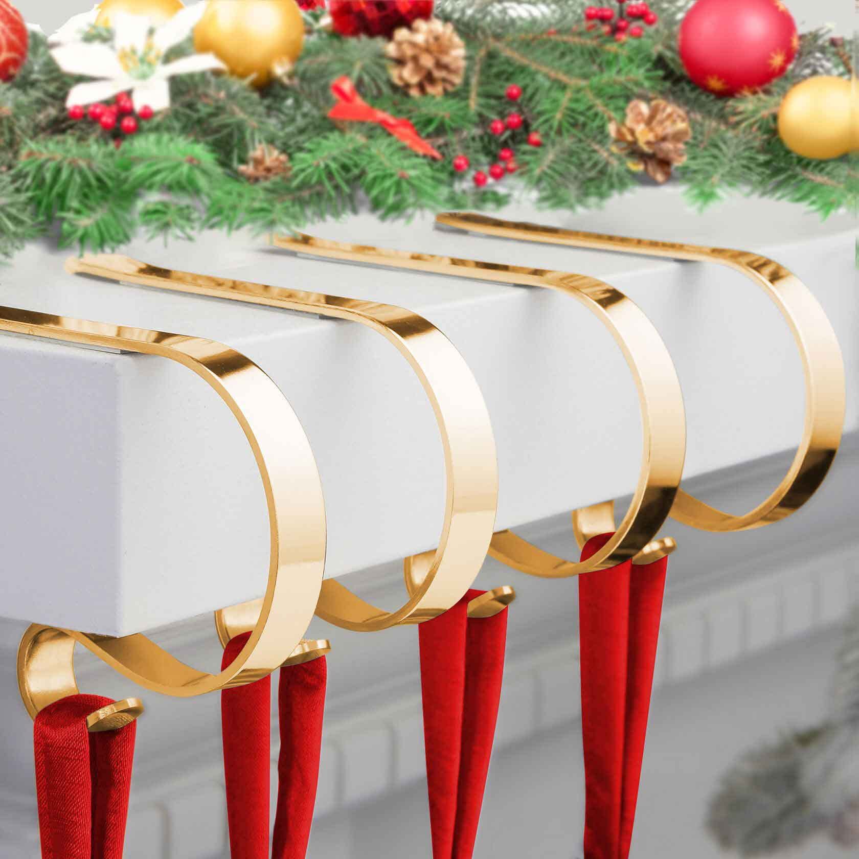 Photo 1 of Christmas Stocking Holder,4 Pack Stocking Holders for Mantle,Non-Slip Stocking Holders for Christmas Decorations,Lightweight Stocking Hangers for Mantel Fireplace with Adjustable Design,Gold