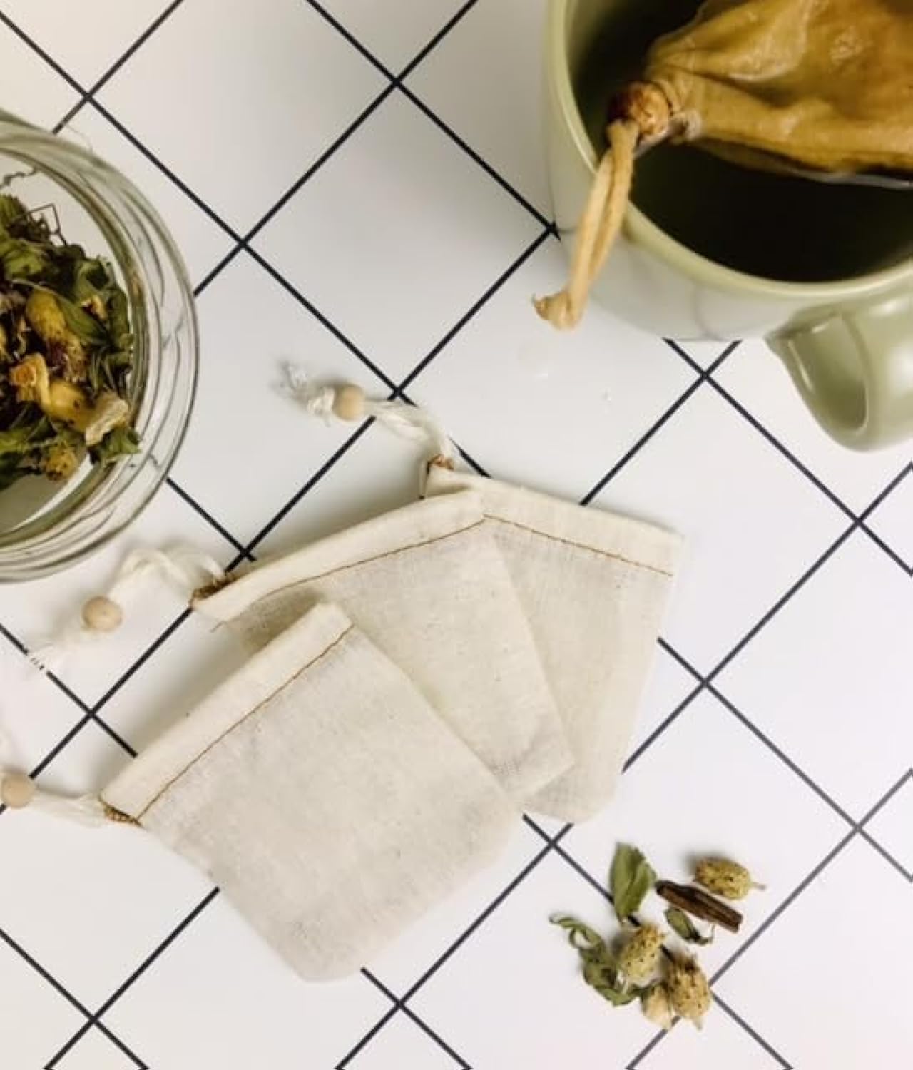 Photo 1 of (5 pack) Tea Filter Bags 100% Unbleached Cotton Reusable Tea Filter, Spice Bags for Cooking Soup/Herb/Loose Leaf Tea, Washable Natural filter, Organic, Ecological (Cup 5 pack))