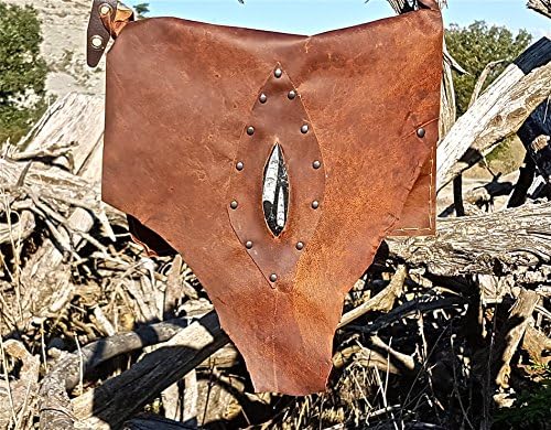 Brown leather handbag with a fossil stone.