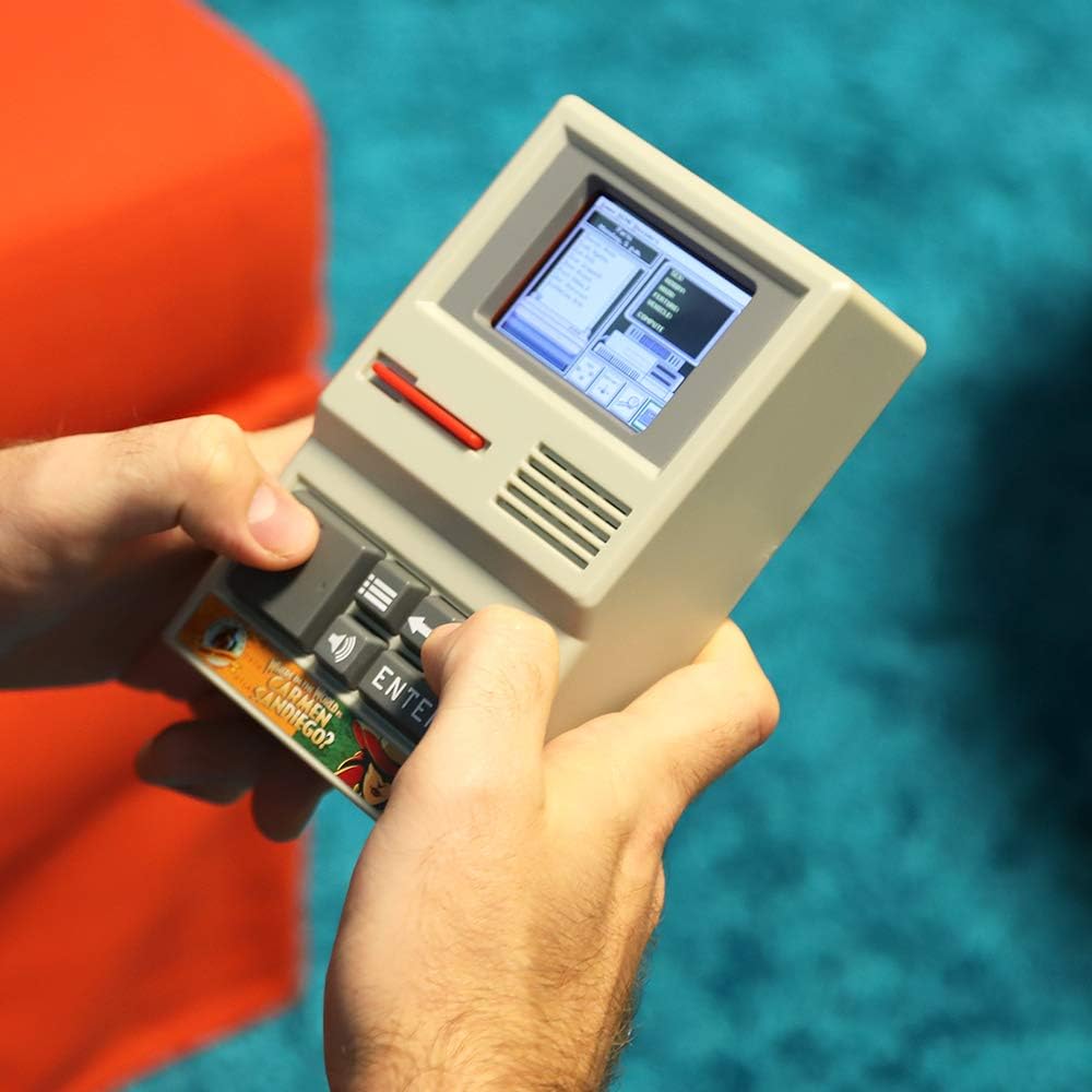 Basic Fun 09613 Carmen Sandiego Handheld Electronic Game: Toys & Games
