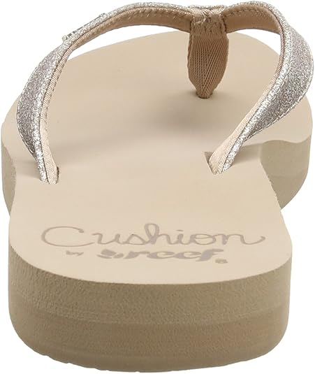 reef star cushion almond