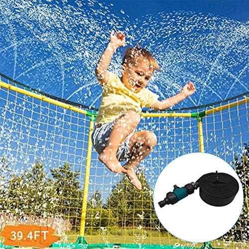Children playing on a water trampoline with a sprinkler hose for added fun.