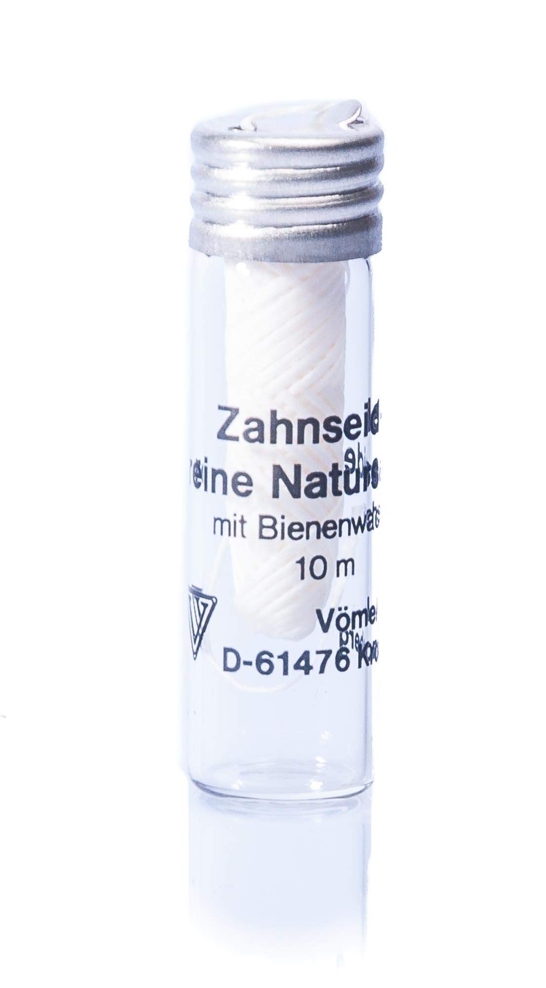 Toothbrush in glass bottle