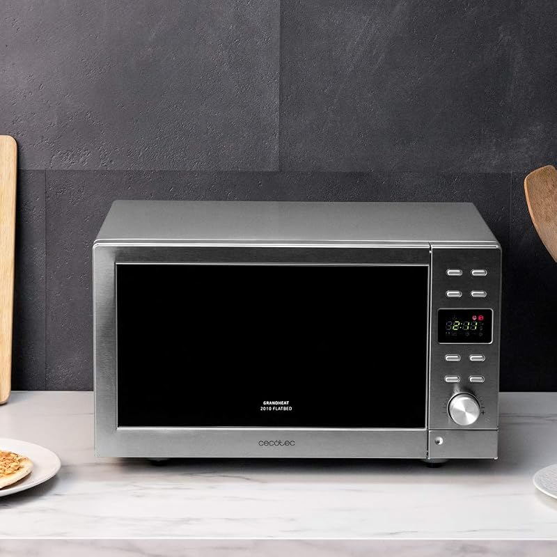 Forno a Microonde senza gradheat piatto 2300 tocco piatto bianco. Capacità 23 litri, potenza 800 W, 8 funzioni preconfigurate, timer fino a 95 minuti