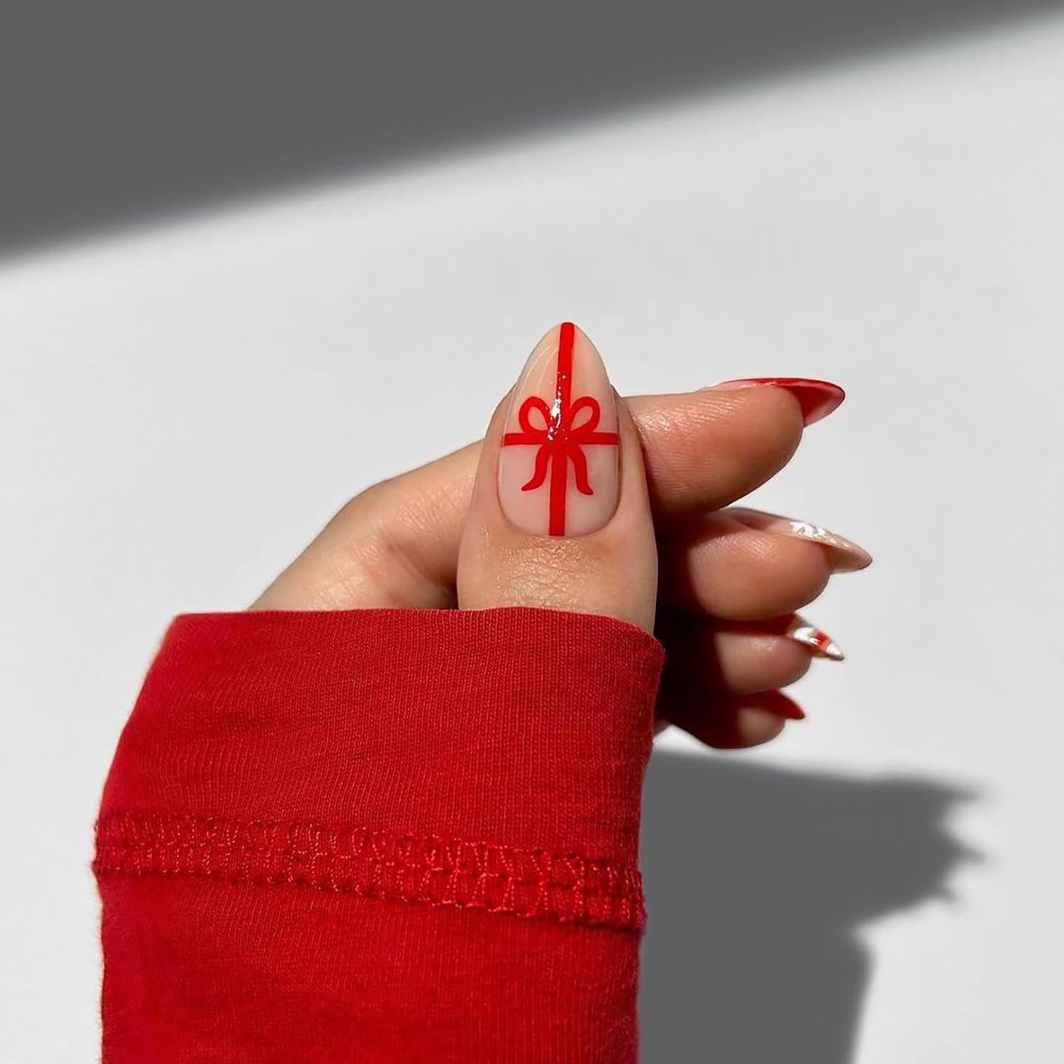 Christmas Press on Nails Medium Almond MABKJLF Red French Tip Fake Nails False Nails with Designs Cute Christmas Hat Snowflake Bow Glossy Glue on Nails for Women Girls 24 Pcs - Image 3