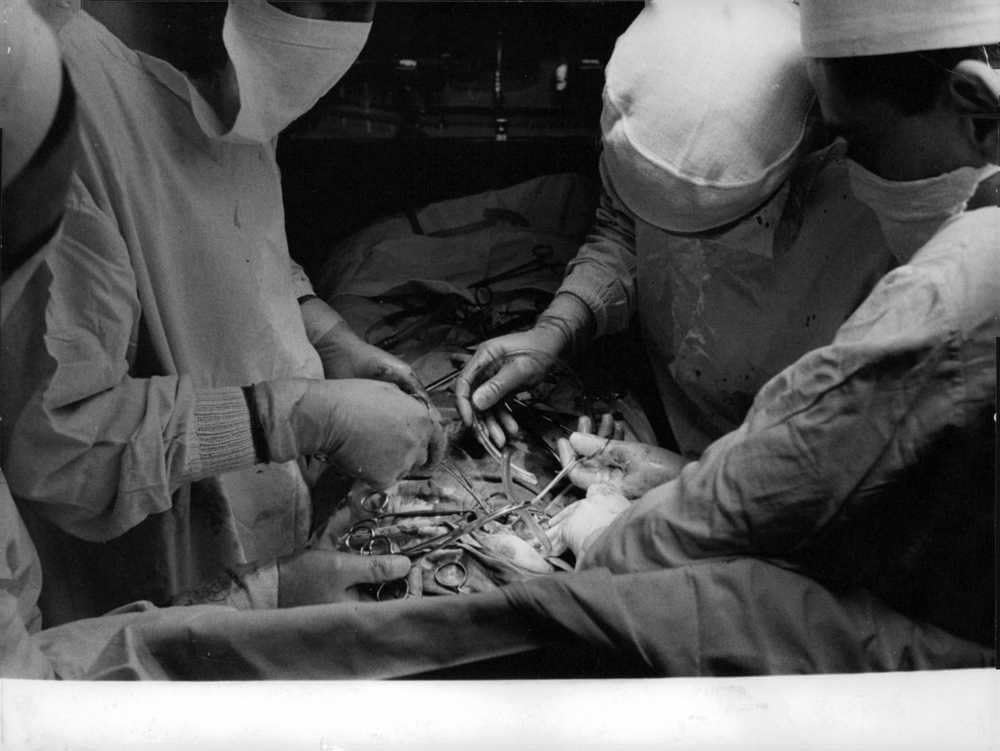 Photographs - Vintage photo of Some doctors are operating a surgery in an operation in the hospital. 1958.