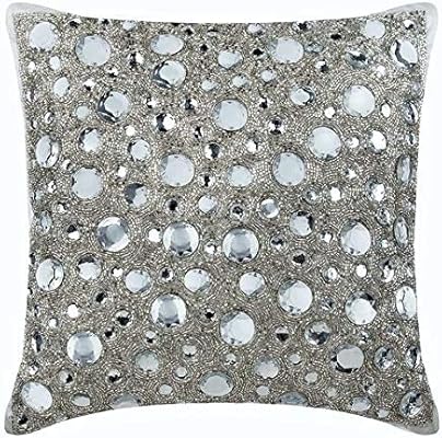 white and silver throw pillows