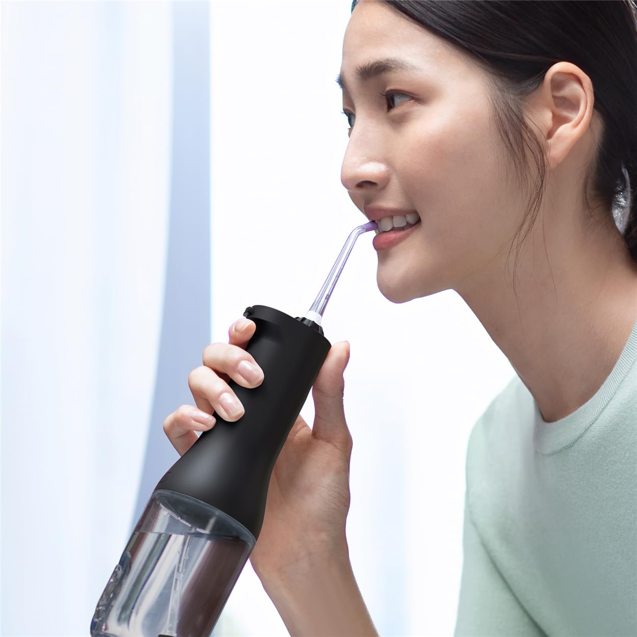 Philips Sonicare kabellose Power Flosser Munddusche und DiamondClean 9000 elektrische Zahnbürste – Saubere Zähne, sauberes Zahnfleisch und Plaque-Entfernung, schwarz (Modell HX3886/43) 2