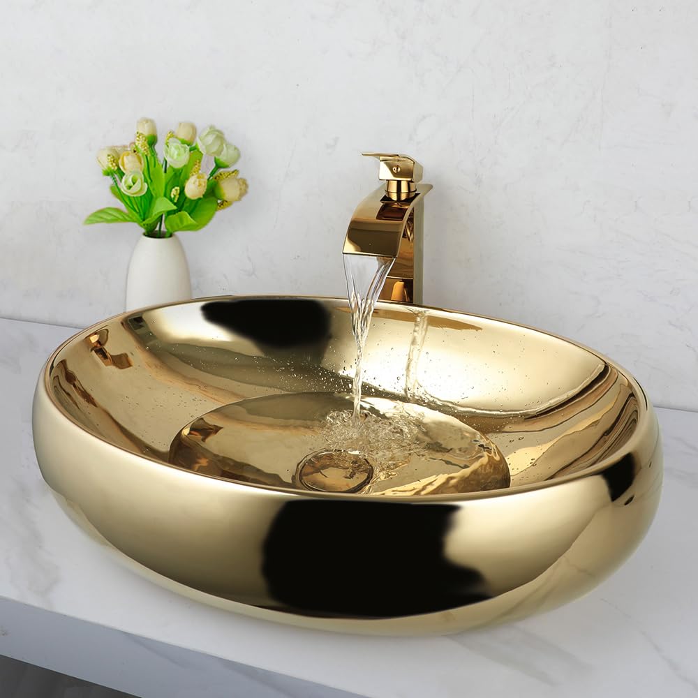 Photo 1 of KECTIAKL 23 Inch Bathroom Vessel Sink with Waterfall Faucet and Pop-Up Drain Combo,Gold Ceramic Sink Bowl Modern Vessel Sink Above Counter Oval Bathroom Sink Basin