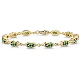 Gem Stone King 18K Yellow Gold Plated Silver Green Tourmaline and White Moissanite Tennis Bracelet For Women (6.91 Cttw, Gemstone Birthstone, Oval 6X4MM, 6.5, 7, 7.5 Inch)