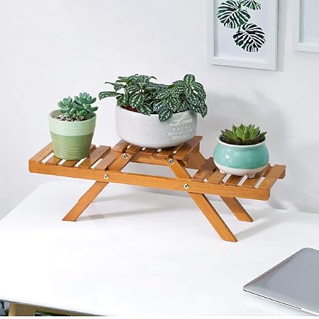 Puesto de plantas El soporte de flor de mesa de bambú de la Tres ...