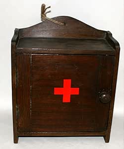 Botiquín de madera antiguo Evardian montado en la pared de primeros