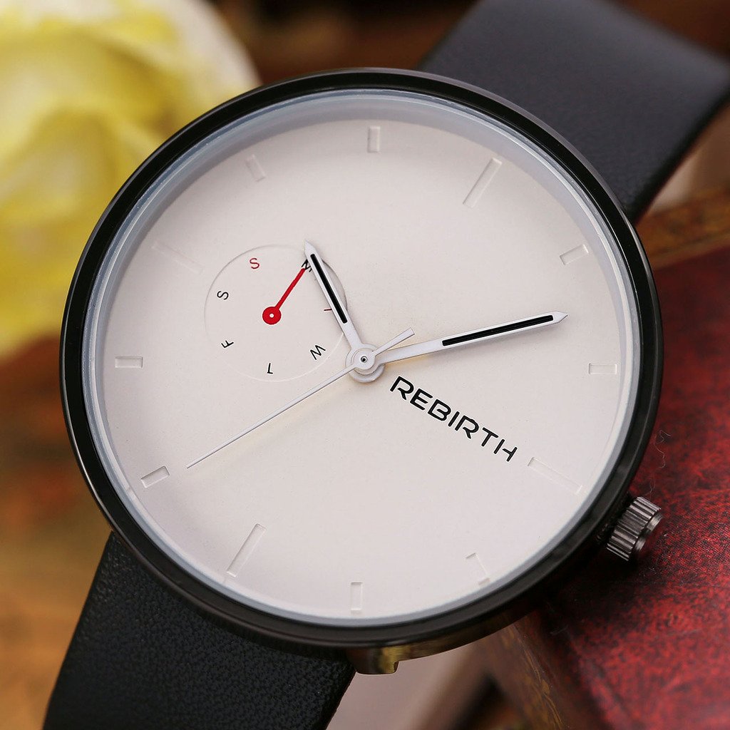 JSDDE Montre à Quartz Unisexe Mouvement Japonais Bracelet PU Style Simple Chic avec Calendrier Montre Etanche + Cadeau Boîtier Cadran Blanc Bracelet Noir