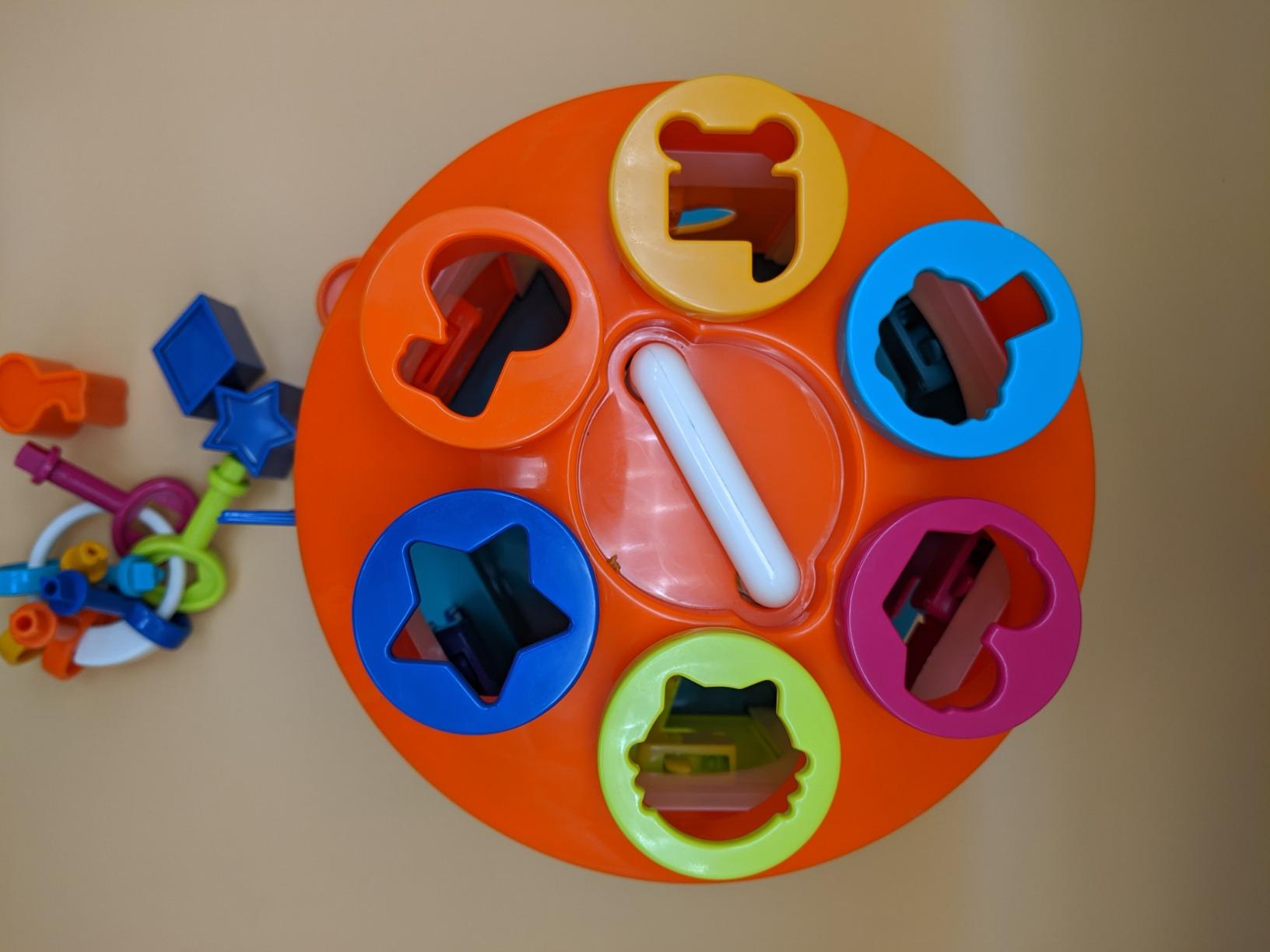 4/mo Finance Battat Shape Sorter House Color and Shape Sorting Toy with 6 Keys and 12