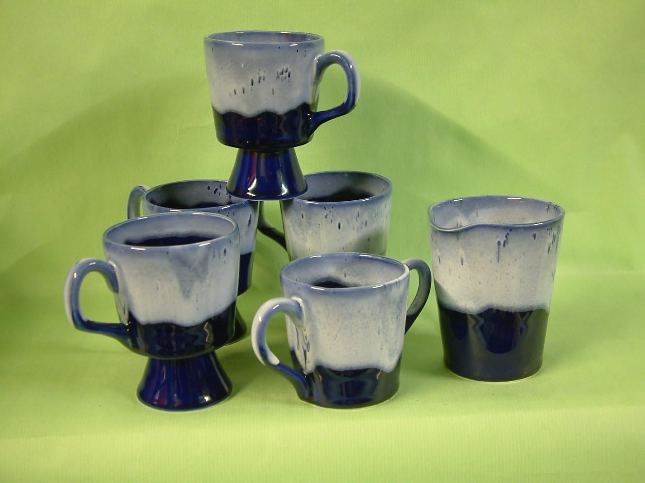 Set of 4 cups 1 milk jug & 1 sugar pot in exclusive design glazed in cobalt blue