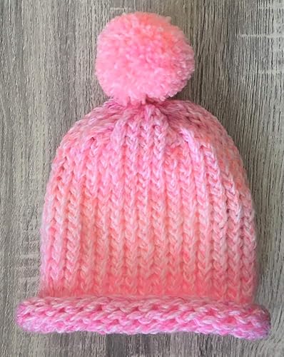 bright pink bobble hat