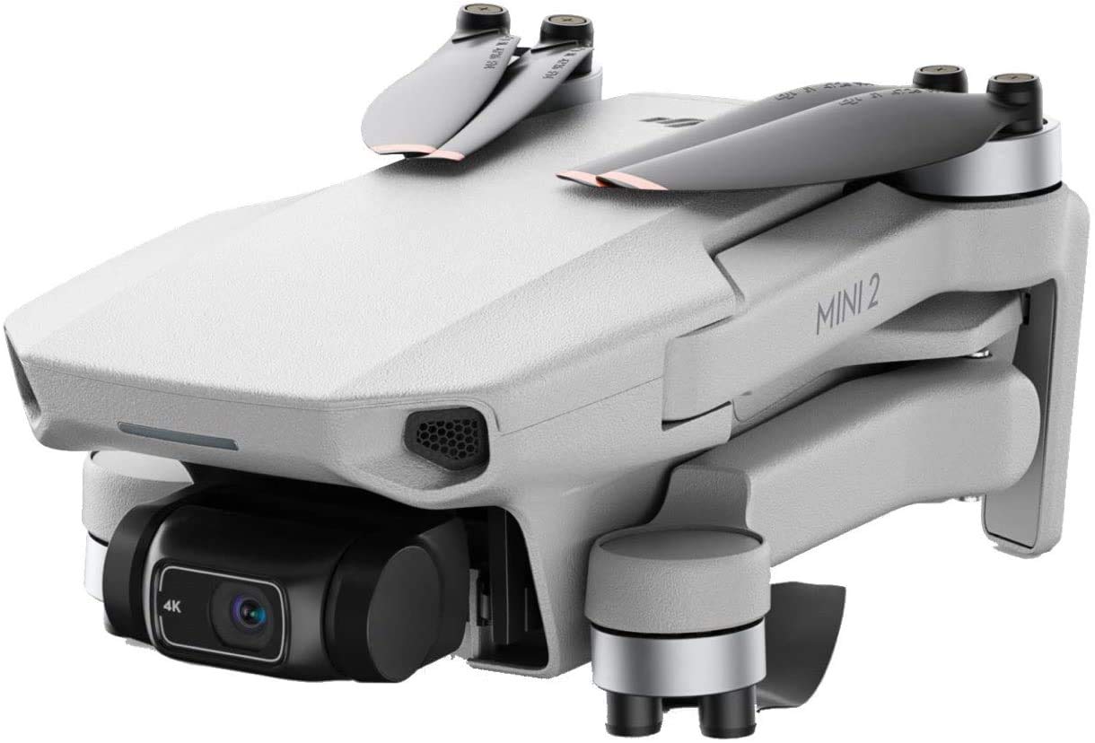 Dji Mini 2 Fly More Combo Ultralight Foldable Drone 3 Axis Gimbal With 4k Camera 12mp Photos 31 Mins Flight Time Ocusync 2 0 10km Hd Video Transmission Quickshots Gray Amazon In Car Motorbike