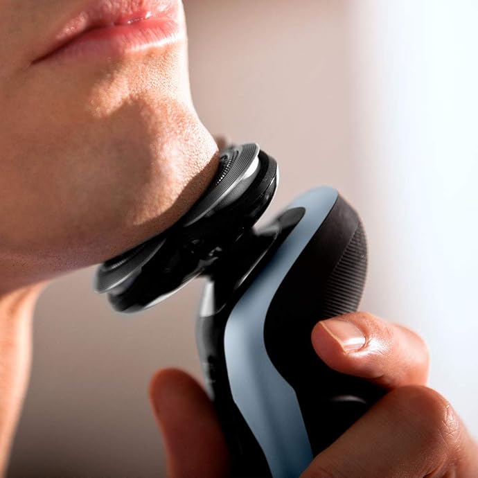 Philips 飞利浦 S9211/26 干湿两用电动剃须刀 带清洁桶 ￥1123.59