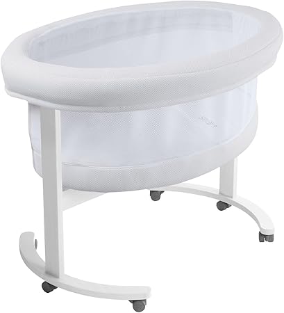 white wooden bassinet