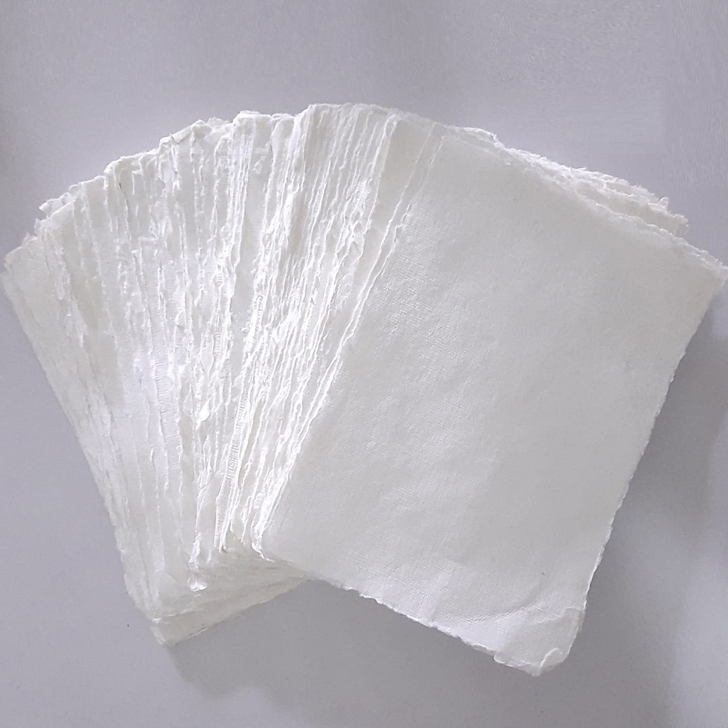 Photo 1 of E-Tailor Handmade Cotton Deckle Edge Paper Loose Leaf Sheets 130 GSM Ivory White (Pack of 1-12x18-20-Sheets)