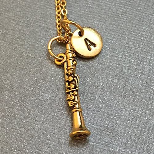necklace, charm, musical instrument