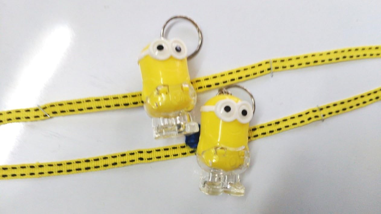 marcumen yellow plastic & light minion rakhi with light for kid (boy) set of 2