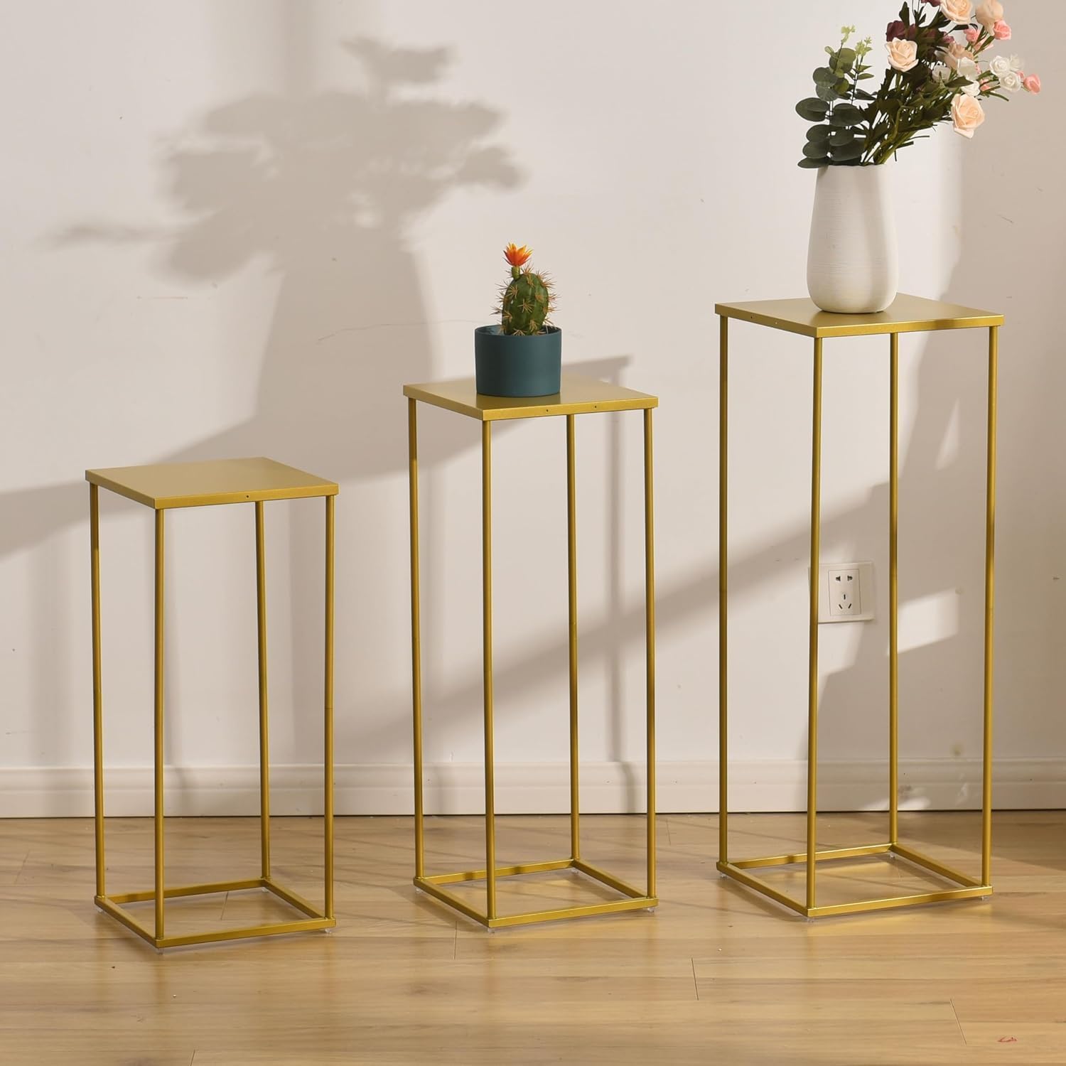 Photo 1 of VINCIGANT Gold Pedestal Stand for Party ,Set of 3 Metal Plant Stand Tall Cake Cylinder Pedestal Stand for Wedding Flower Vase , Corner Planter Pot Rack for Living Room Patio Decor