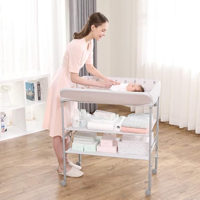 Height adjustable baby change table rhinogaret