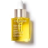CLARINS Santal Soothing Face Treatment Oil for Dry, Sensitive Skin 1 Fl Oz | Hydrates, smoothes, calms redness + irritations and visibly minimizes fine lines. Formulated with 100% plant extracts.