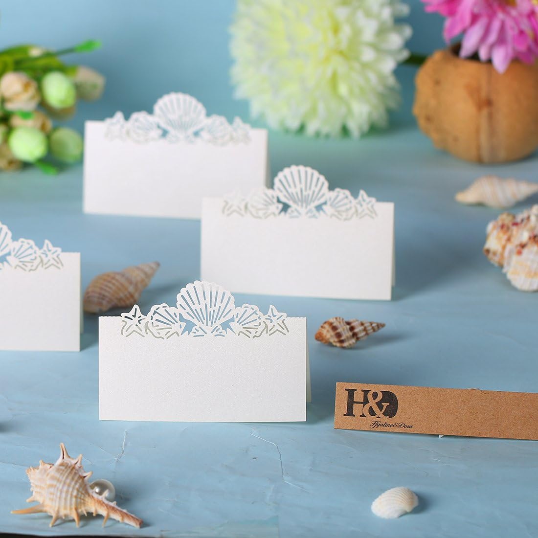Amazon Com 60x Pierced Laser Cut Shell Paper Crafts Wedding Place Card Holder Invitation Card Decorations Kitchen Dining