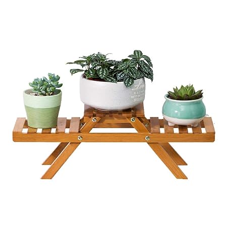 Puesto de plantas El soporte de flor de mesa de bambú de la Tres ...