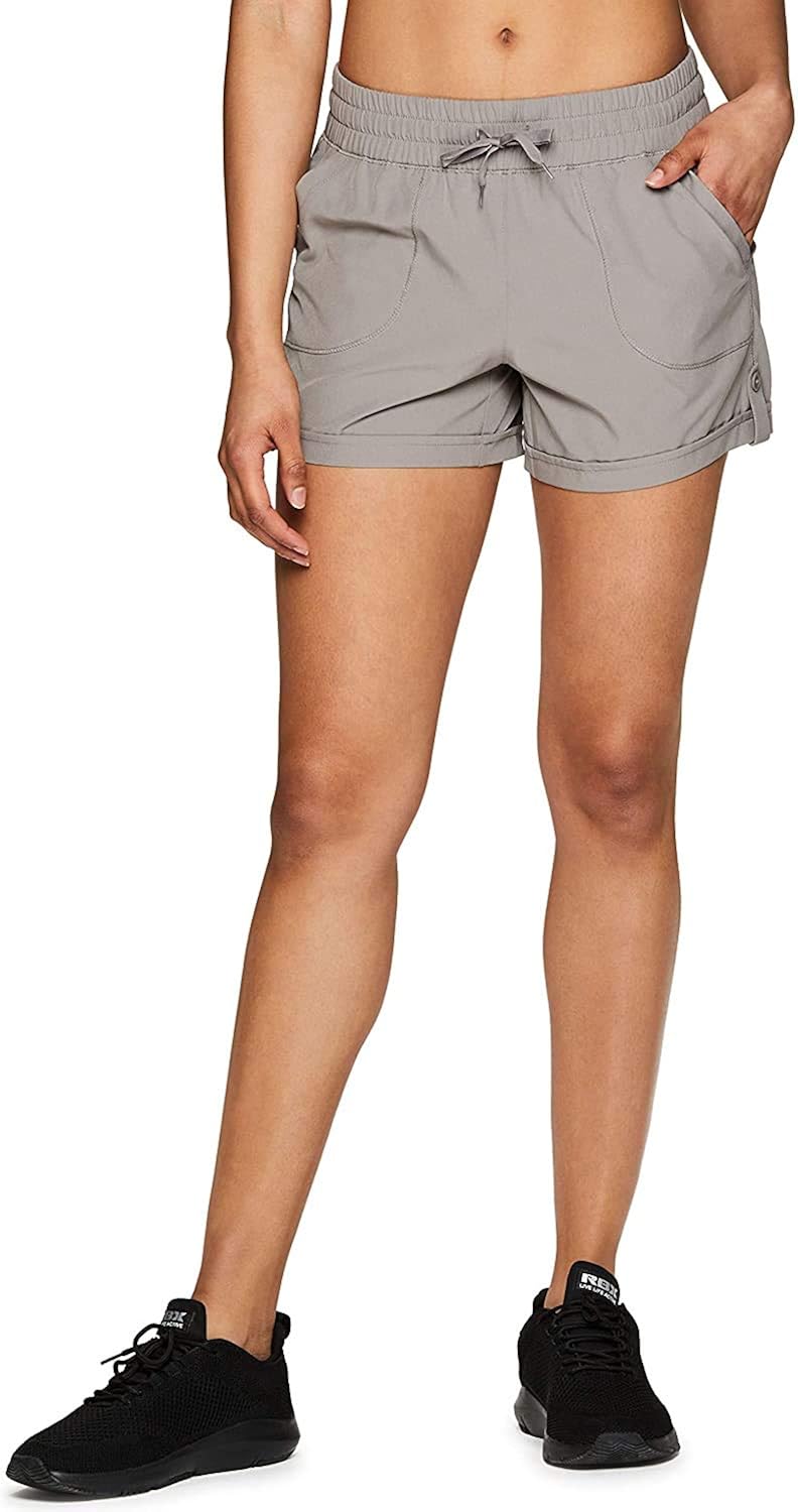 RBX Active Women's Relaxed Fit Breathable Ventilated Stretch Woven Athletic Walking Short with Pockets: Clothing