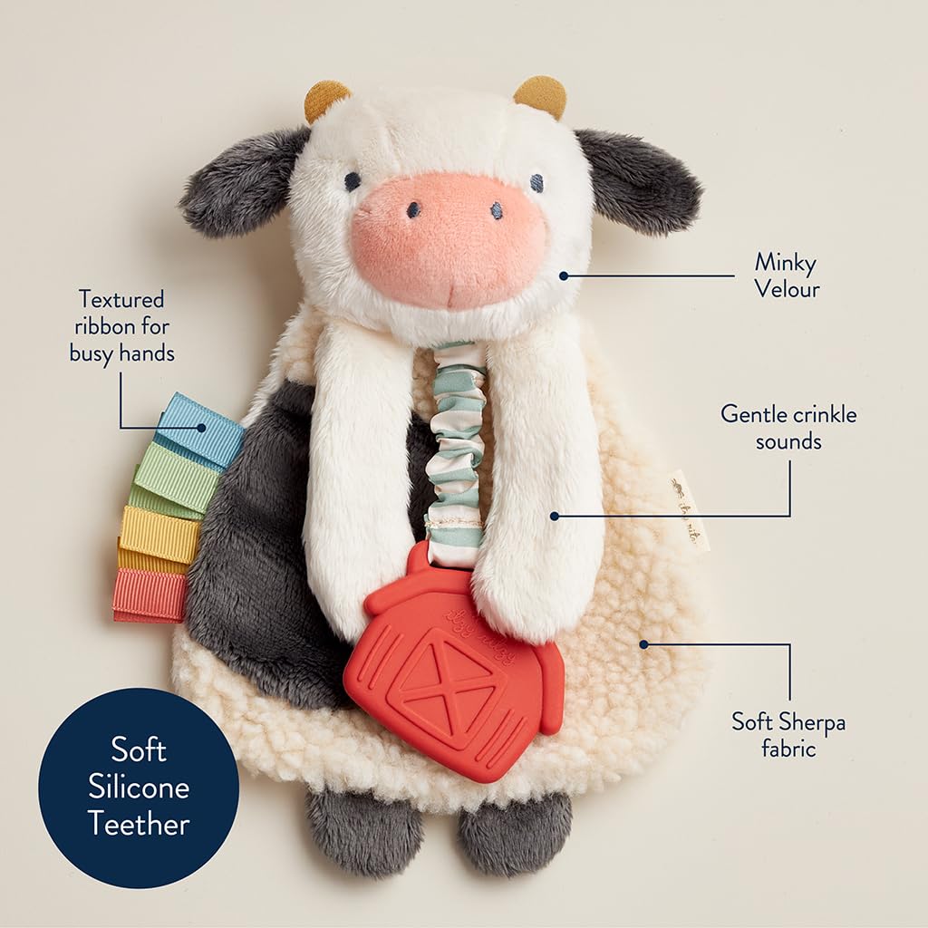 Itzy Ritzy - Itzy Lovey Including Teether - Baby Lovey with Teether, Textured Ribbons & Dangle Arms - Features Crinkle Sound, Sherpa Fabric and Minky Plush (Cow)