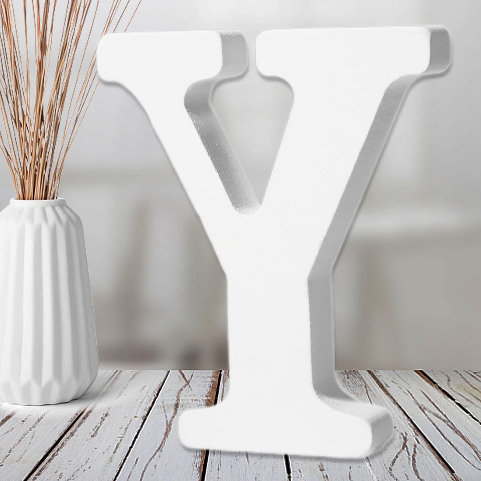 Photo 1 of AOCEAN 6 Inch White Wood Letters - Unfinished Wood Letters for Wall Christmas Decor Standing Letters Slices Sign Board Decoration for Xmas Home Party Projects (Y)