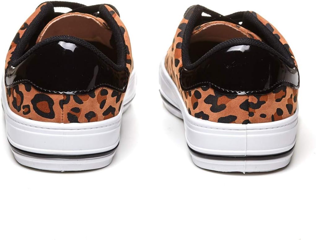 tenis onça beira rio