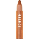 Live Tinted Huestick Multistick - Eye Lip Cheek Cream Stick - Grounded | One stick, four uses: color corrector, cream blush, lipstick and eyeshadow with buildable, blendable color.