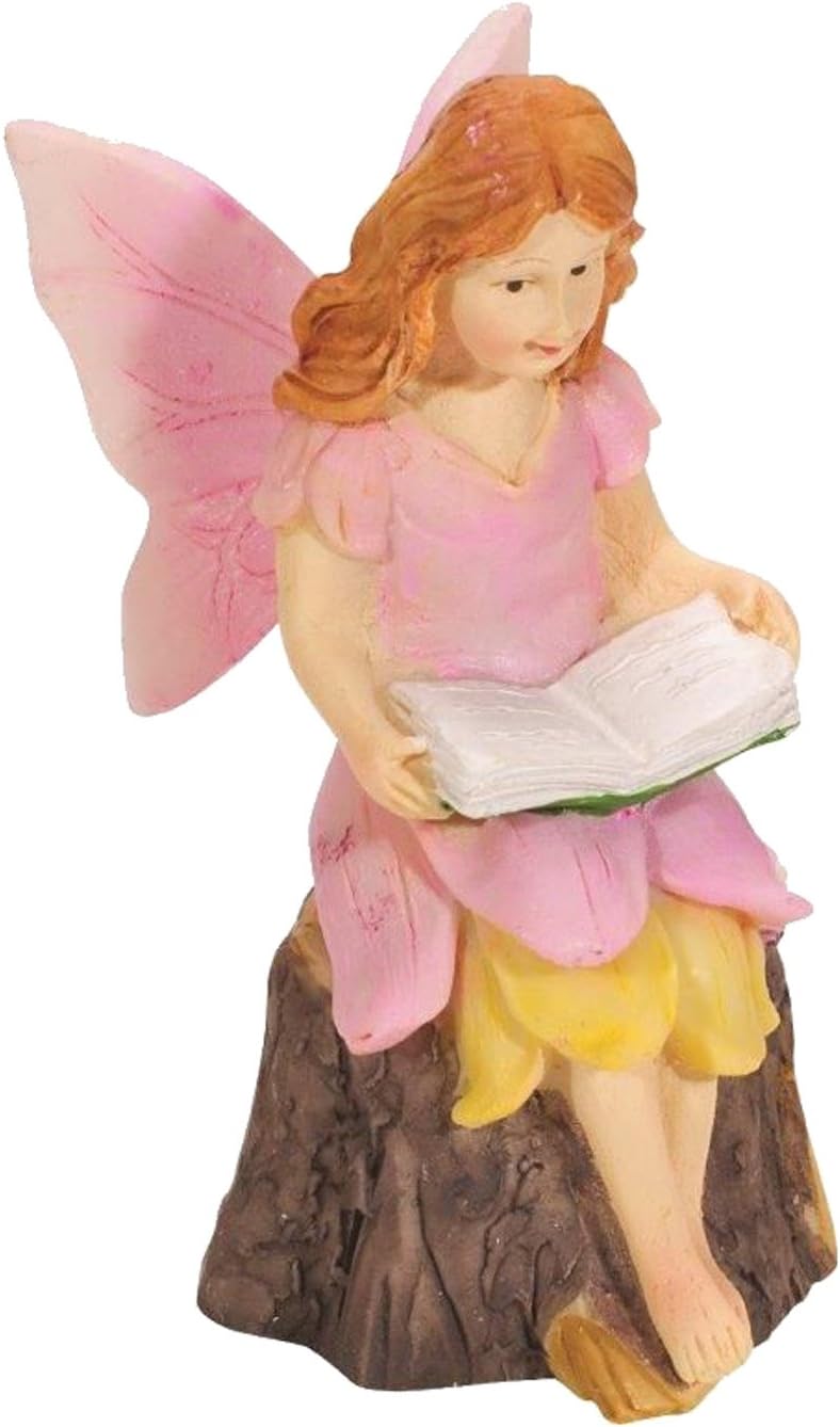 Pink Fairy Sitting ON Tree Stump Reading A Book