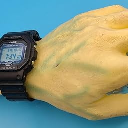 severed hand dog toy