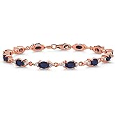 Gem Stone King 18K Rose Gold Plated Silver Blue Sapphire and White Moissanite Tennis Bracelet For Women (7.57 Cttw, Gemstone Birthstone, Oval 6X4MM, 6.5, 7, 7.5 Inch)