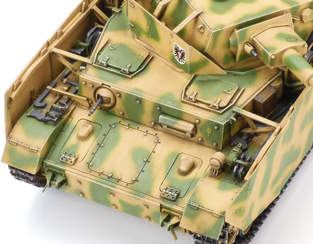 Close-up view of the rear deck and side skirts of the Tamiya 1/35 Pz Kpfw IV Ausf. H model, highlighting intricate details and camouflage.