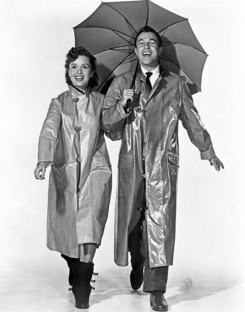 Publicity still of Gene Kelly and Debbie Reynolds from Singing In The Rain Photo Print (8 x 10)