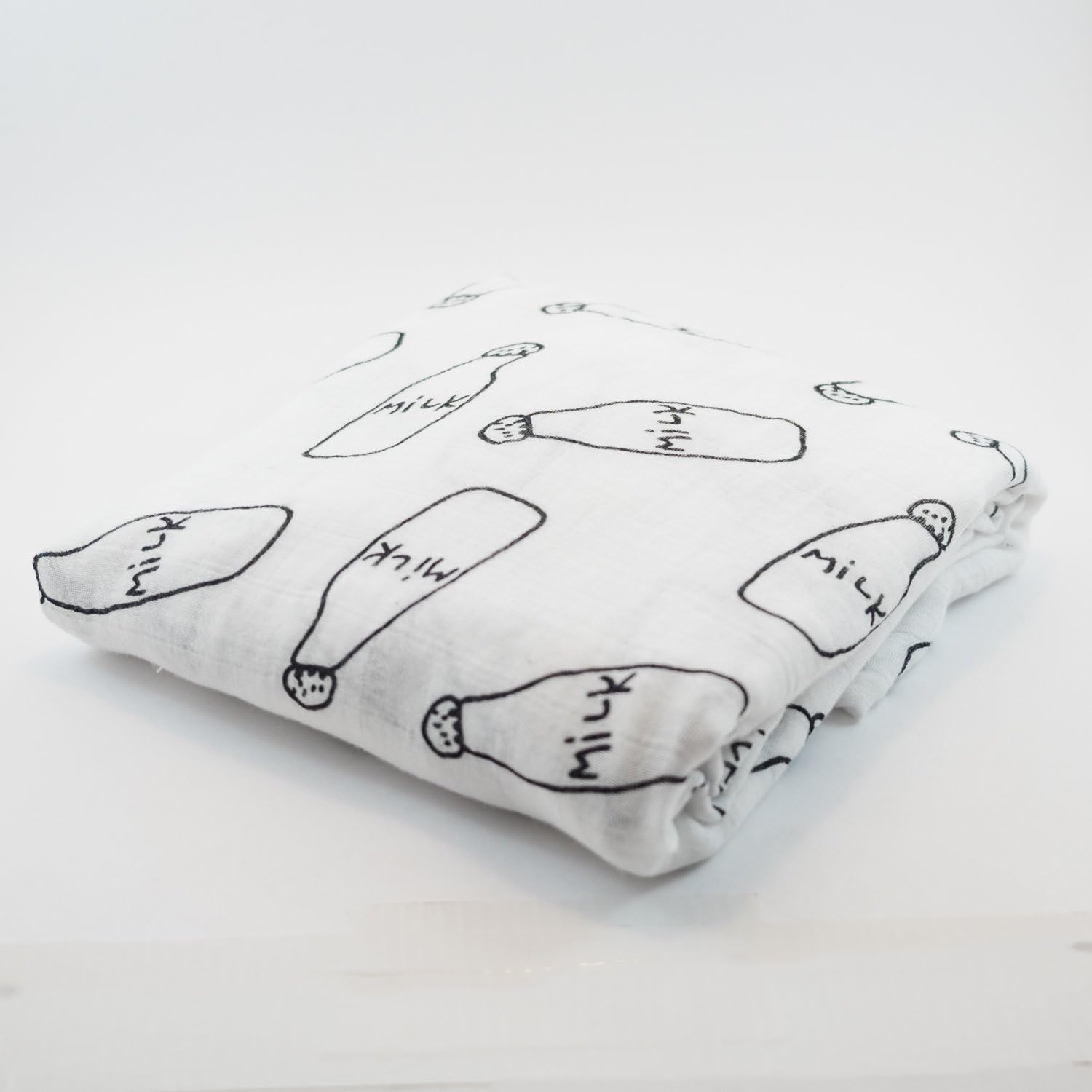 Monochrome Muslin Swaddle Blanket with Milk Design - Perfect for Swaddling and Nursery Set
