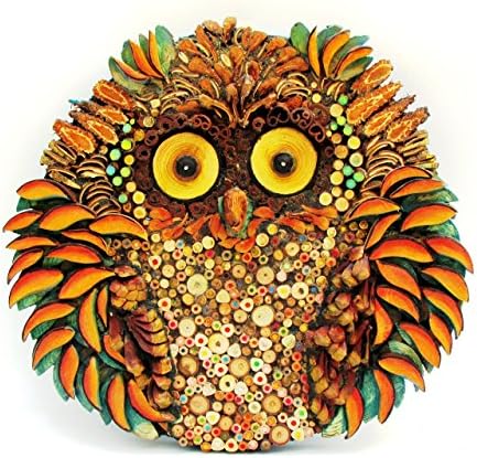 Owl shaped wall picture in my unique mosaic technique where natural materials "blend" with elements of common use to create this one of a kind piece.