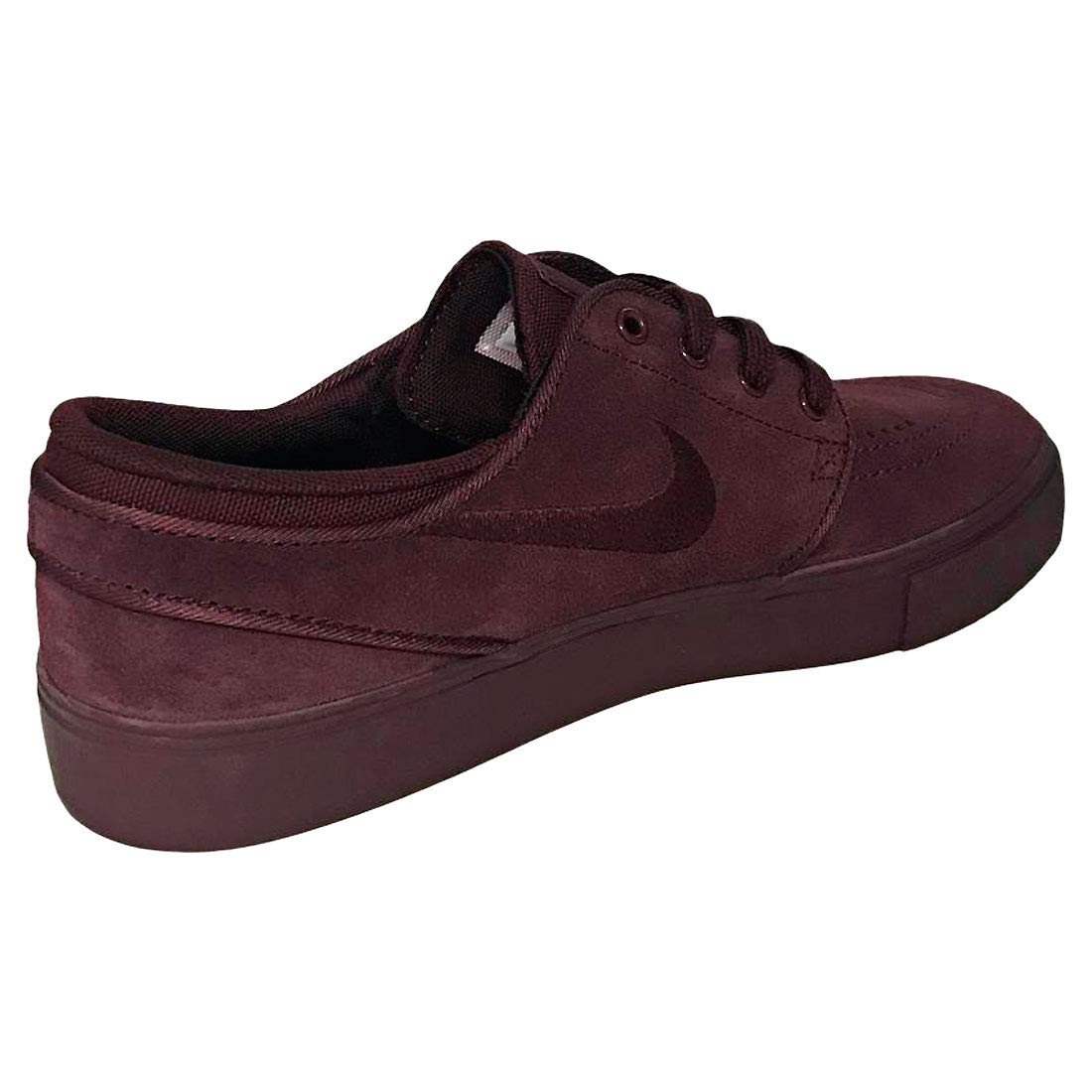 zwarte nikes met goud