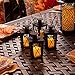 4 Black Mini Flameless Lanterns with 4 Ivory Resin Votive Candles, Warm White LEDs, Matte Finish, Indoor/Outdoor Use, Batteries & Remote Included