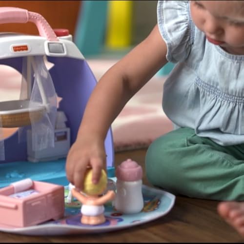 little people cuddle and play nursery