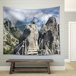 Hanging Bridge in Steep Rocks with Going Man. Ai-Petri, Crimea - Fabric Wall Tapestry Home Decor - 51x60 inches