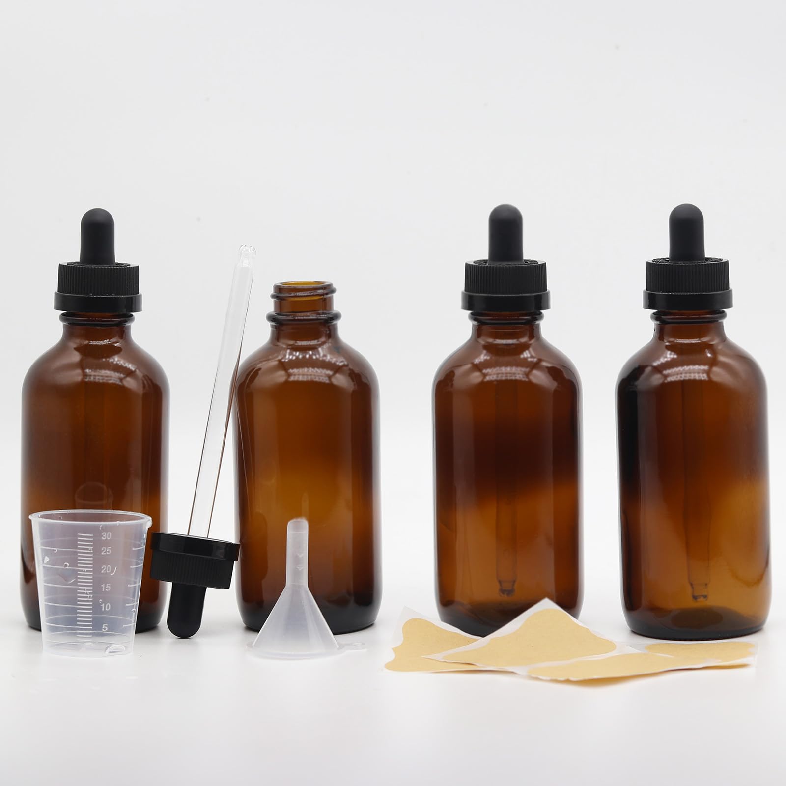 Photo 1 of Toaazhy 4 pack,amber glass dropper bottles 4 oz,120 ml dark empty tincture bottles with dropper,alcohol,hair oil bottle applicator,essentia,eye,droppers for oils,medicine,pipette,drip drop,travel