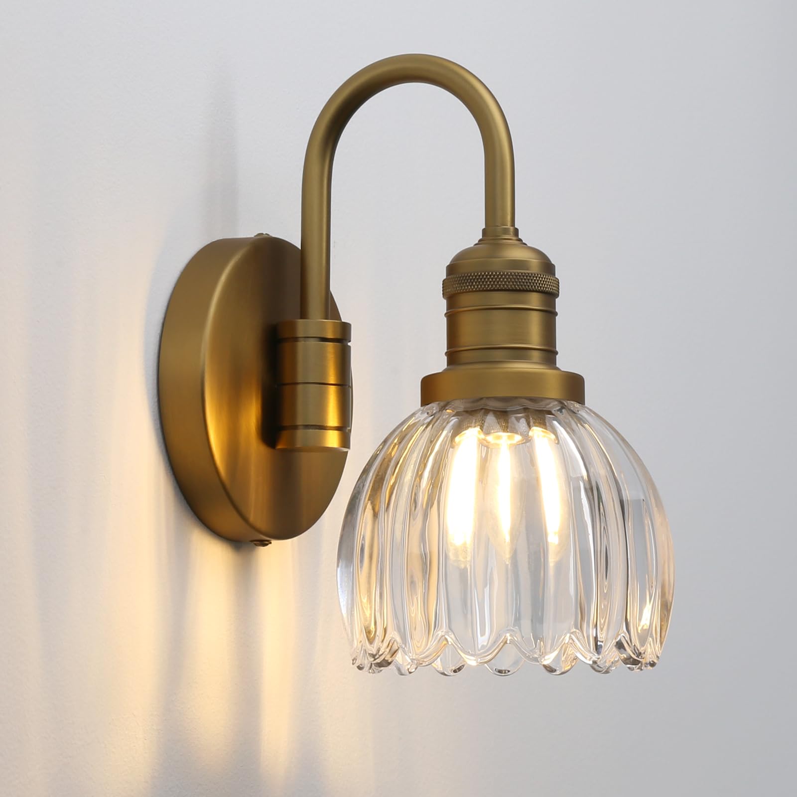 Photo 1 of Yosoan Boho Aged Brass Gold Vintage Bathroom Wall Sconce with Flower Shade, 1-Light Indoor Vanity Industrial Hardwired Wall Mounted with Transparent Tulip Shade for Living Room Bedroom(Antique)