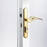 House Guard Brass Storm and Screen Door Handle Set with Lock and Key | Fits 1.1-1.97 in doors; reversible latch, 22/26mm backset, 2.5 in spacing